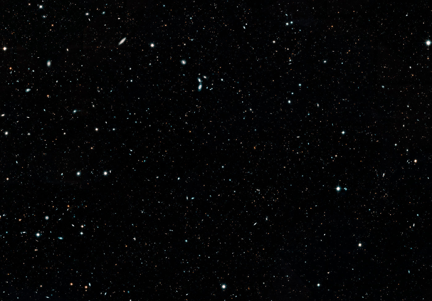A portion of ESA and NASA's Hubble Legacy Field image, which includes observations taken by several Hubble deep-field surveys, including the eXtreme Deep Field (XDF). NASA, ESA, G. Illingworth and D. Magee (University of California, Santa Cruz), K. Whitaker (University of Connecticut), R. Bouwens (Leiden University), P. Oesch (University of Geneva), and the Hubble Legacy Field team.