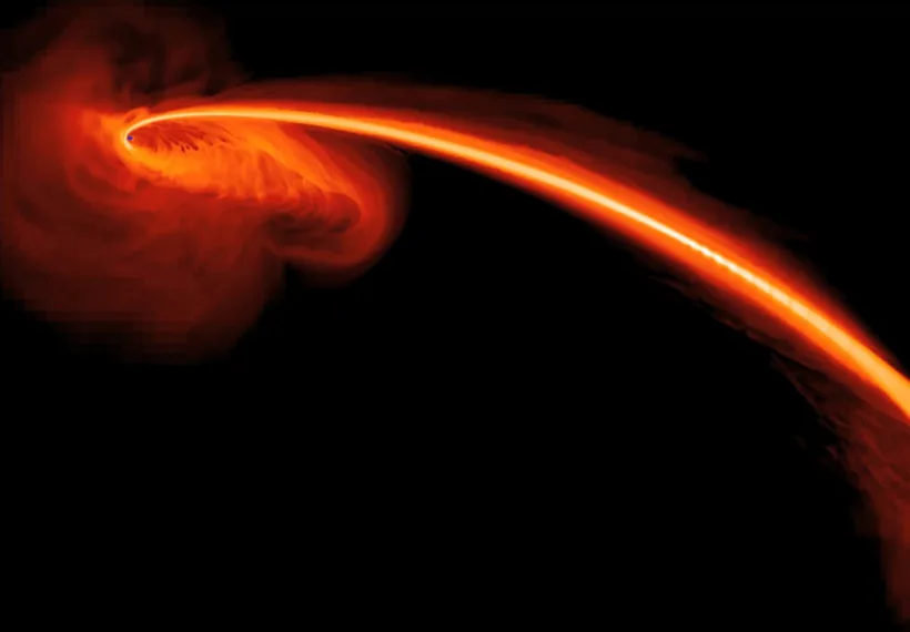 Computer-simulated image by NASA, S. Gezari (The Johns Hopkins University), and J. Guillochon (University of California, Santa Cruz) showing gas from a star that is ripped apart by tidal forces as it falls into a black hole in the galaxy PS1-10jh about 2.7 billion light years from Earth.