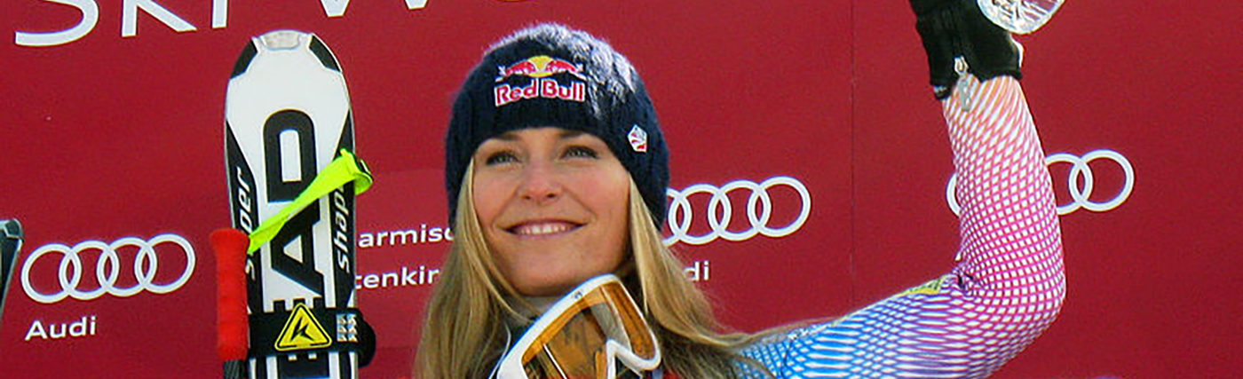 Lindsey Vonn on the podium. Image Credit: U.S. Ski Team / CC BY (https://creativecommons.org/licenses/by/2.0)