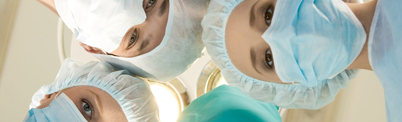 Storyblock’s image of masked medical professionals in a circle looking at camera.