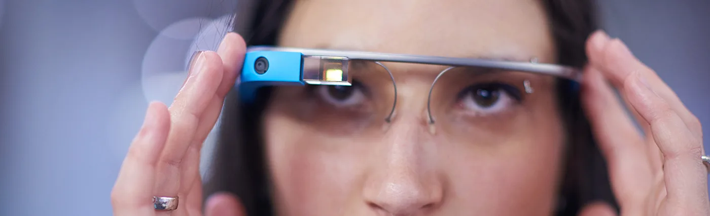Storyblock’s image of a woman looking through tech glasses.