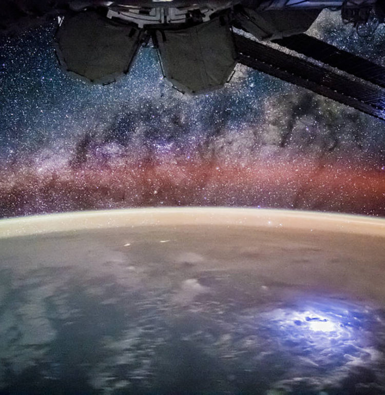 NASA’s photo from the International Space Station with a lightning storm on Earth below and the Milky Way above, taken by the Expedition 44 crew.