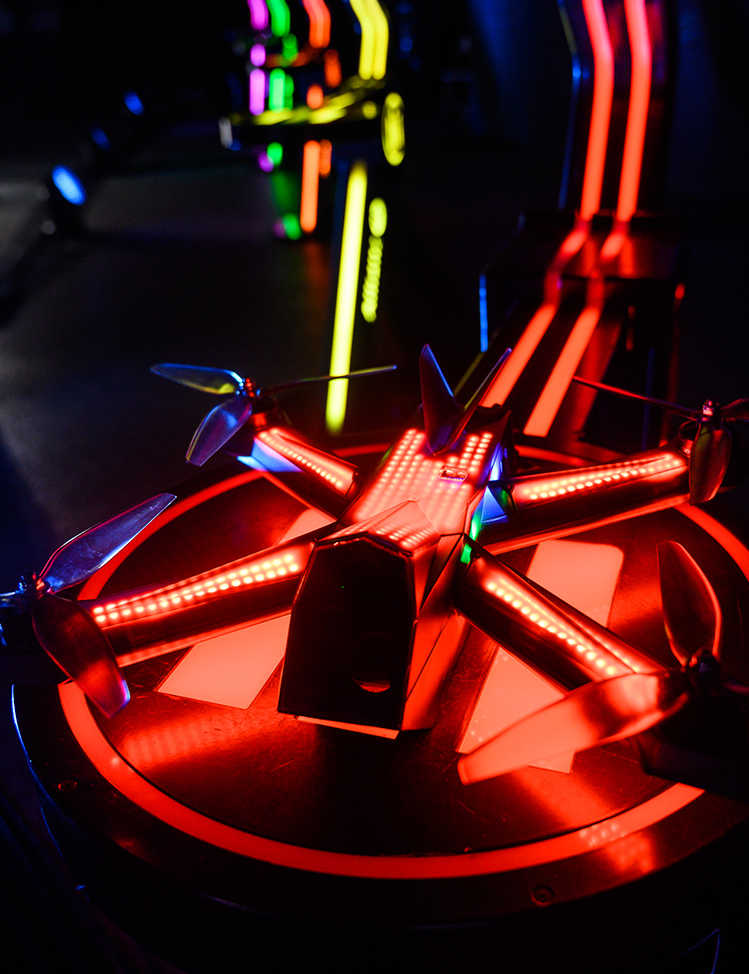 Drone Racing League’s Photo of a Drone Sitting on a Podium.