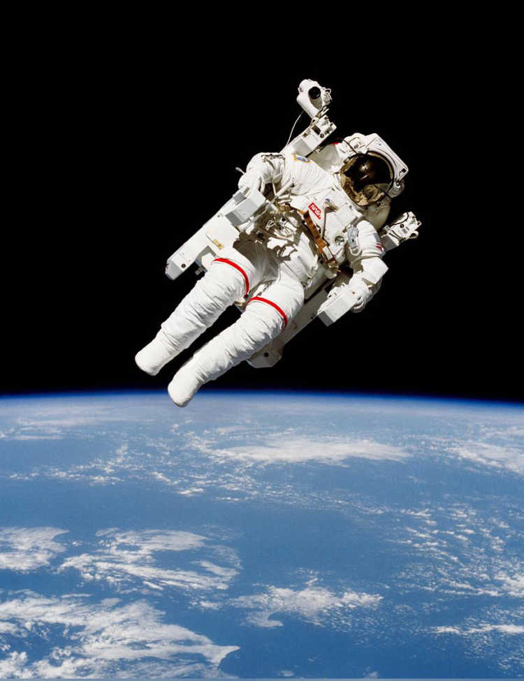 NASA's image of astronaut Bruce McCandless II on a spacewalk a few meters away from the cabin of the space shuttle Challenger on Feb. 7, 1984.