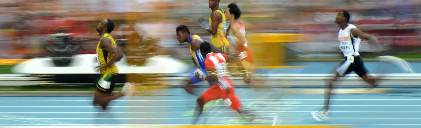 Tobi 87's Image of Usain Bolt during the 100m heat of the 14th IAAF World Championships in Athletics, via Wikimedia Commons.