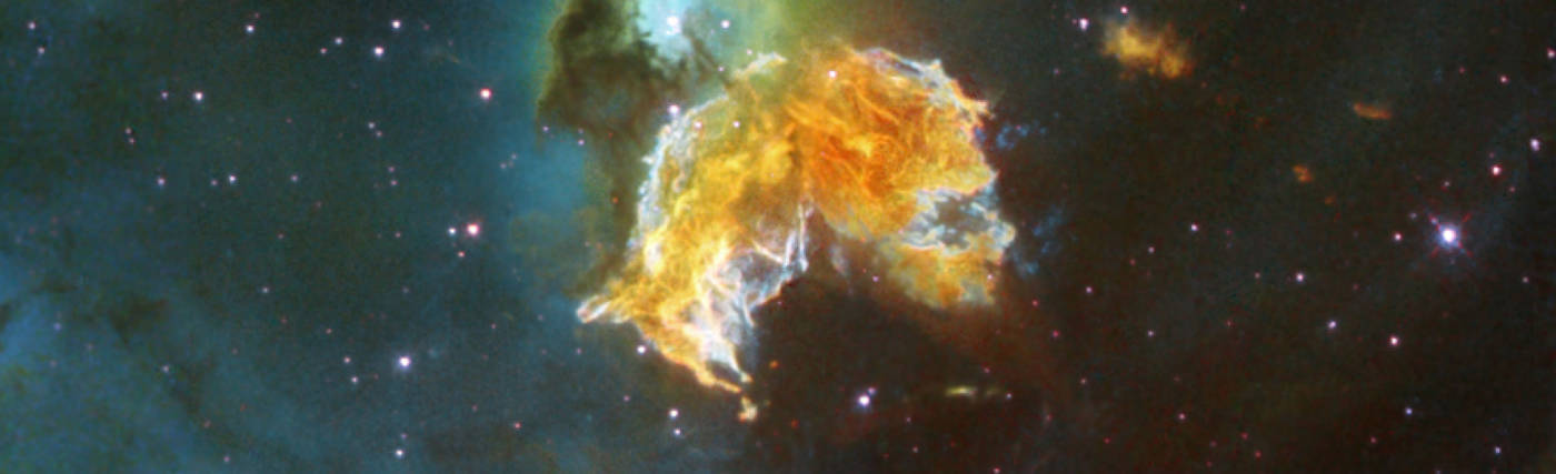 A violent and chaotic-looking mass of gas and dust is seen in this Hubble Space Telescope image of a nearby supernova remnant. Denoted N 63A, the object is the remains of a massive star that exploded, spewing its gaseous layers out into an already turbulent region.