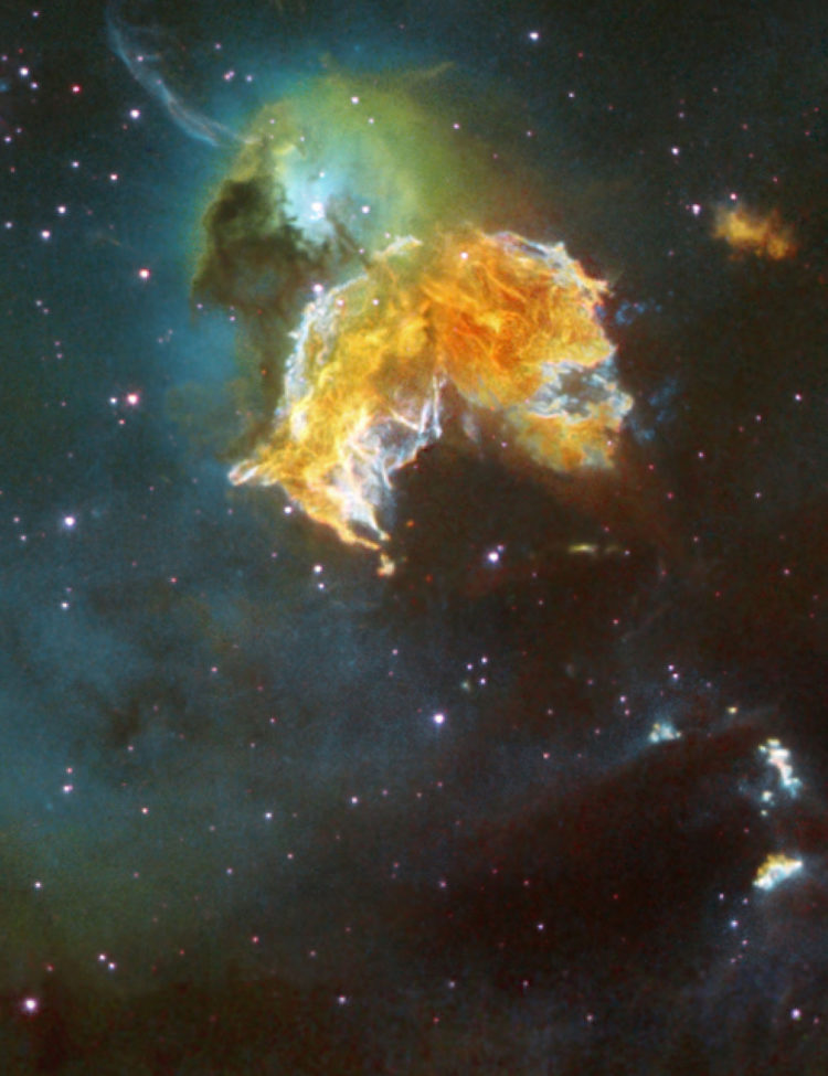 A violent and chaotic-looking mass of gas and dust is seen in this Hubble Space Telescope image of a nearby supernova remnant. Denoted N 63A, the object is the remains of a massive star that exploded, spewing its gaseous layers out into an already turbulent region.