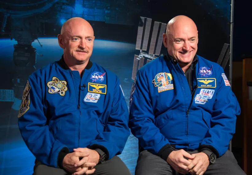 Identical twin astronauts, Scott and Mark Kelly, are subjects of NASA’s Twins Study. Scott (right) spent a year in space while Mark (left) stayed on Earth as a control subject. Researchers looked at the effects of space travel on the human body. Credit: NASA.