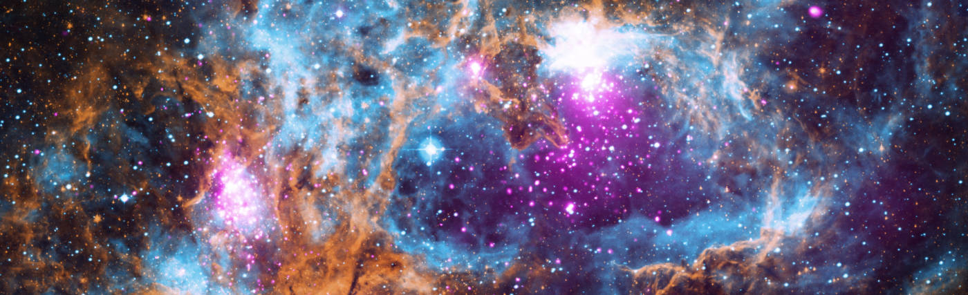 Composite image contains X-ray data from NASA’s Chandra X-ray Observatory and the ROSAT telescope (purple), infrared data from NASA’s Spitzer Space Telescope (orange), and optical data from the SuperCosmos Sky Survey (blue) made by the United Kingdom Infrared Telescope.