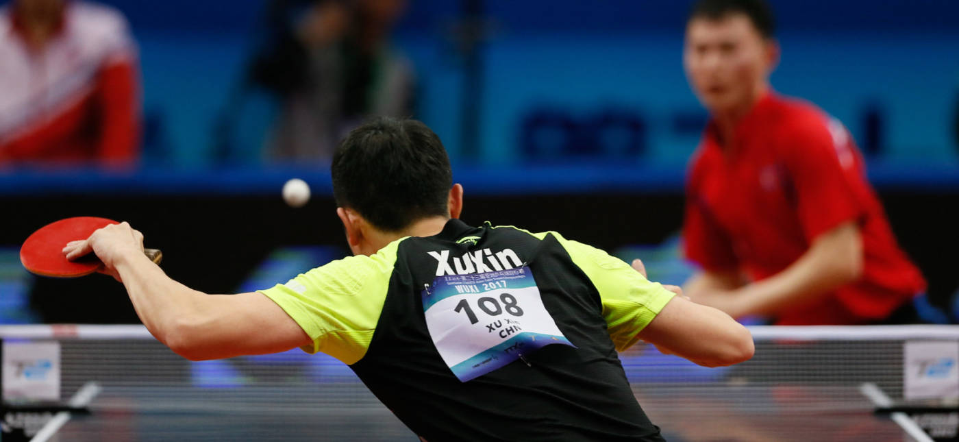 XIAOYU TANG’s photo of a table tennis player hitting a ball.