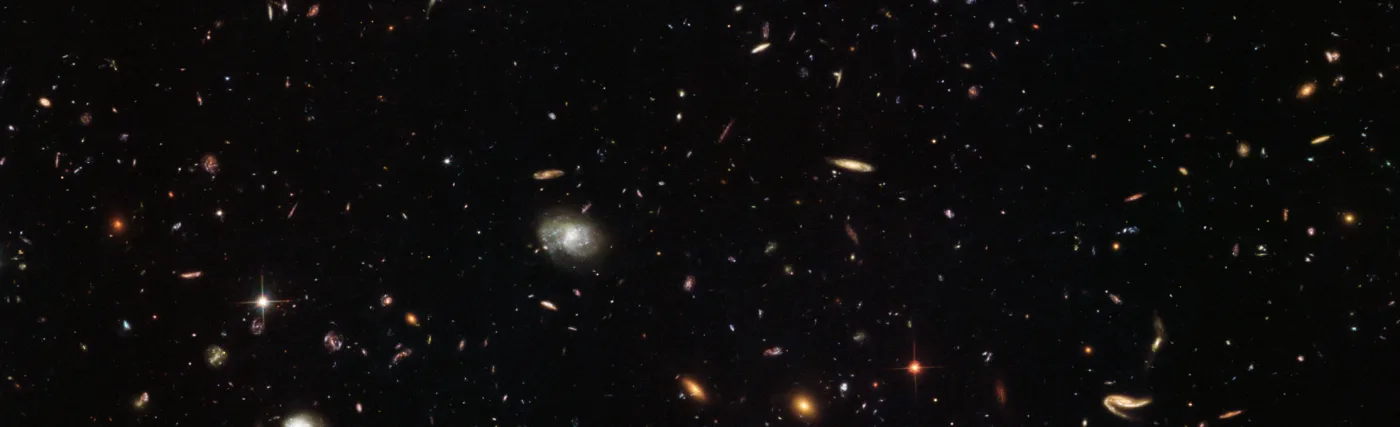 Nearly as deep as the Hubble Ultra Deep Field, which contains approximately 10,000 galaxies, this incredible image from the Hubble Space Telescope reveals thousands of colorful galaxies in the constellation of Leo (The Lion).