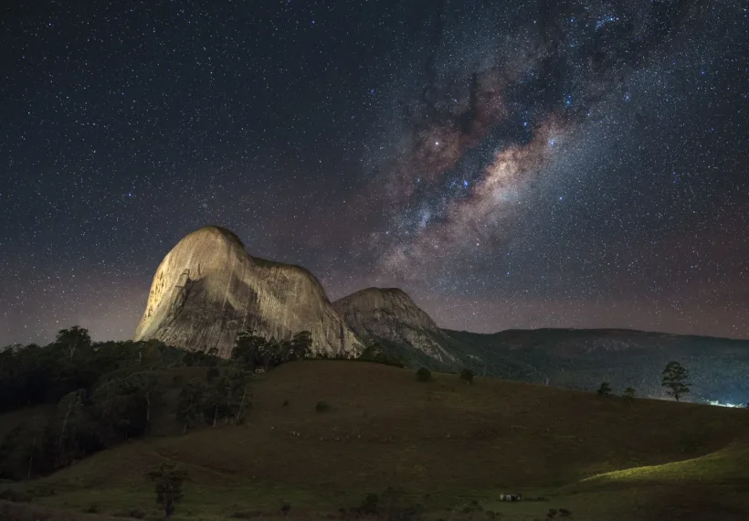 EduardoMSNeves’s photo of Pedra Azul (Blue Stone) peak with the center of the Milky Way above it. Pedra Azul State Park is a state park in Domingos Martins, Espírito Santo, Brazil.