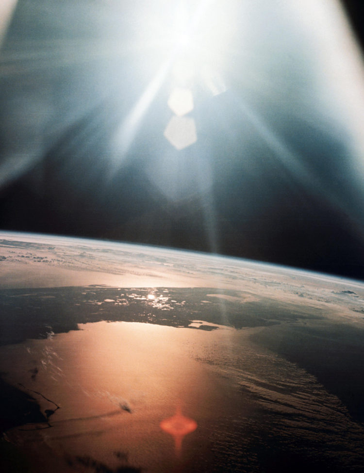 The morning sun reflects on the Gulf of Mexico and the Atlantic Ocean as seen from the Apollo 7 spacecraft during its 134th revolution of the Earth on Oct. 20, 1968.