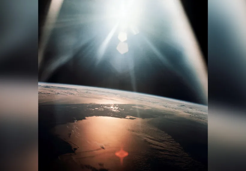 The morning sun reflects on the Gulf of Mexico and the Atlantic Ocean as seen from the Apollo 7 spacecraft during its 134th revolution of the Earth on Oct. 20, 1968.