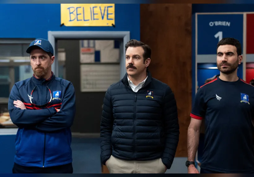 Brendan Hunt, Jason Sudeikis and Brett Goldstein in “Ted Lasso” season two, now streaming on Apple TV+.