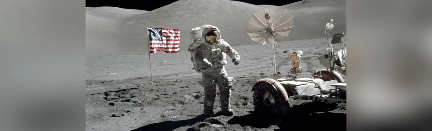 Astronaut Eugene A. Cernan, mission commander, walks toward the Lunar Roving Vehicle (LRV) at the start of the third extravehicular activity (EVA-3) at the Taurus-Littrow landing site of NASA's sixth and final Apollo lunar landing mission.