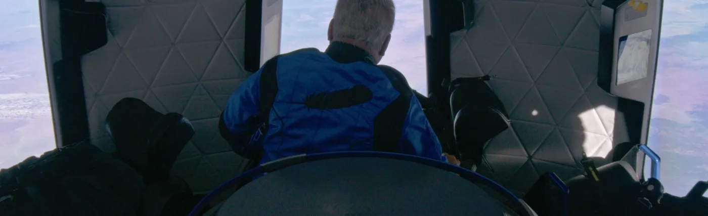 William Shatner looks out of the New Shepard windows on NS-18. (October 13, 2021)