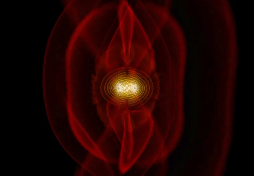 Frame from a simulation of the merger of two black holes and the resulting emission of gravitational radiation (colored fields). The outer red sheets correspond directly to the outgoing gravitational radiation that one day may be detected by gravitational-wave observatories.