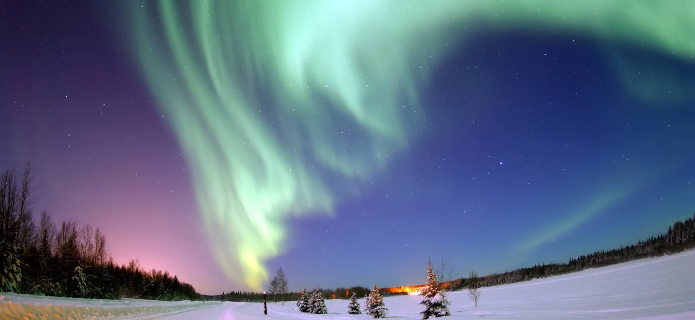 Eielson Air Force Base, Alaska — The Aurora Borealis, or Northern Lights, shines above Bear Lake