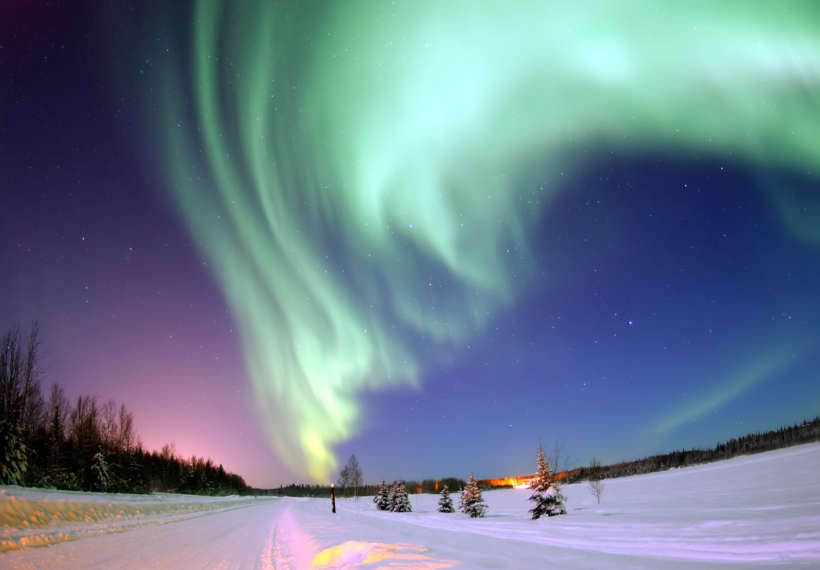 Eielson Air Force Base, Alaska — The Aurora Borealis, or Northern Lights, shines above Bear Lake