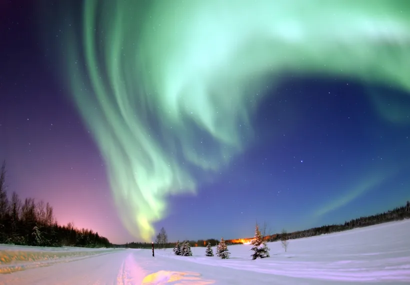 Eielson Air Force Base, Alaska — The Aurora Borealis, or Northern Lights, shines above Bear Lake