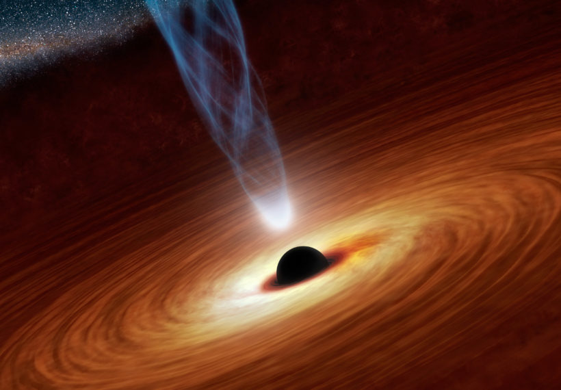 This artist's concept illustrates a supermassive black hole with millions to billions times the mass of our sun. Also shown is an outflowing jet of energetic particles, believed to be powered by the black hole's spin.