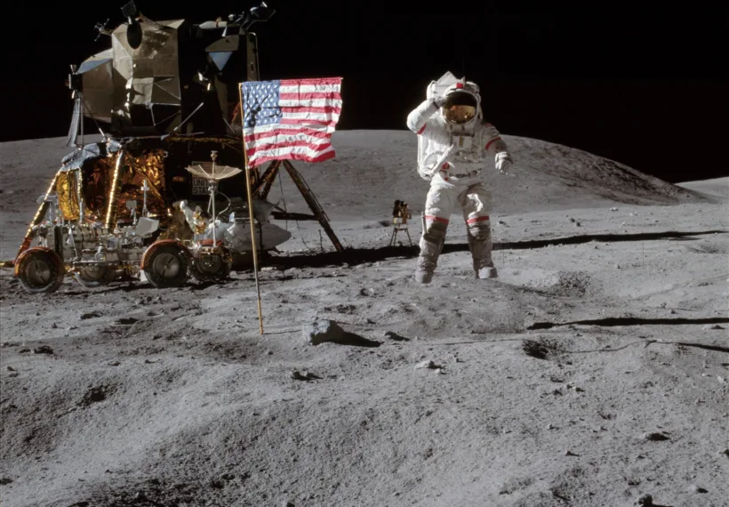 John W. Young on the Moon during Apollo 16 mission jumping about 42 Centimeters high. Charles M. Duke Jr. took this picture. The LM Orion is on the left. April 21, 1972