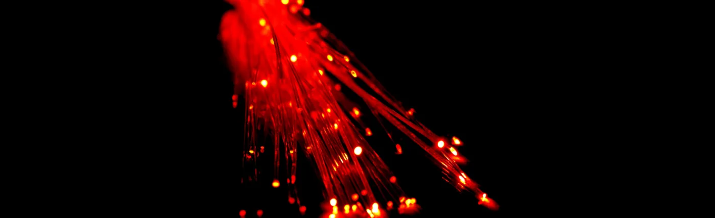 Glowing red optical fibers.
