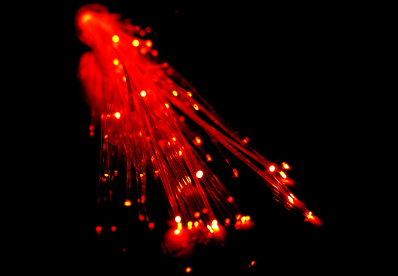 Glowing red optical fibers.