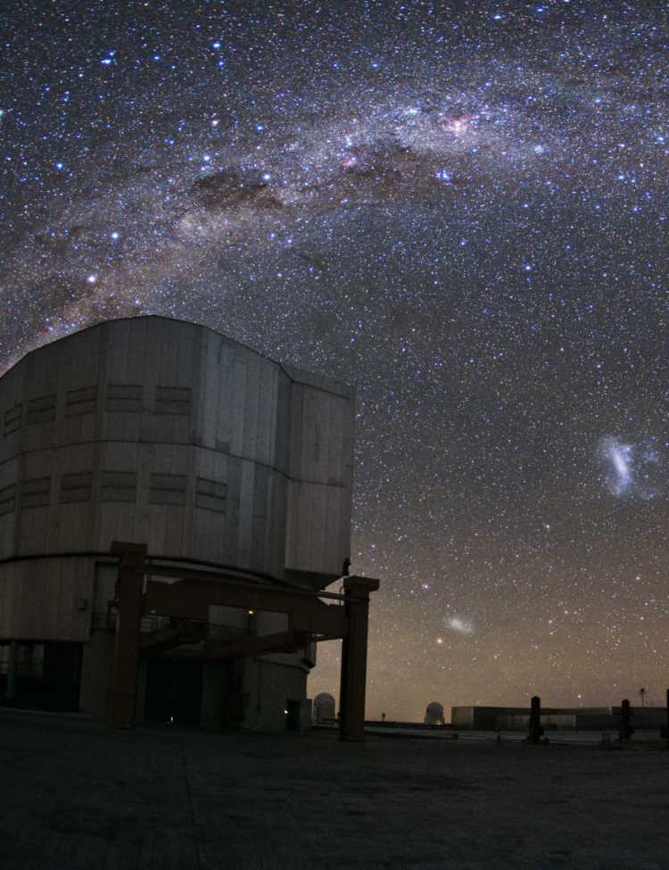 Taken by ESO photo ambassador Yuri Beletsky, two of the Very Large Telescope's Unit Telescopes quietly bask in the starlight, observing the Milky Way as it arches over ESO's Paranal Observatory atop Cerro Paranal high above the Atacama Desert in Chile.