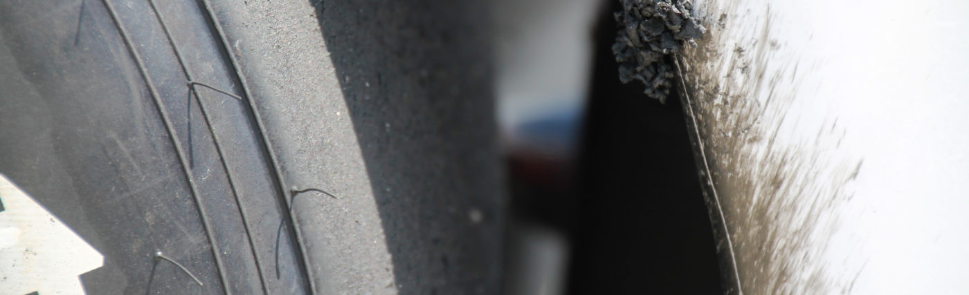 Detail on a tire and car (Helio Castroneves) after the 99th running of the Indianapolis 500