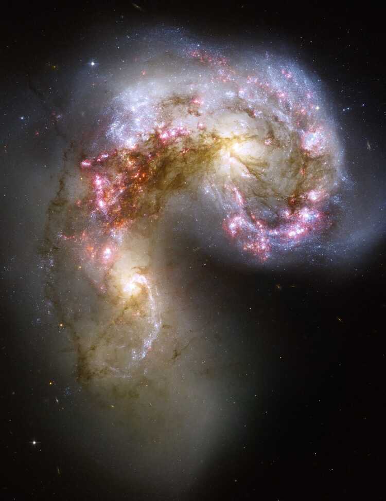 This NASA Hubble Space Telescope image of the Antennae galaxies (NGC 4038 & 4039) is the sharpest yet of this merging pair of galaxies. During the course of the collision, billions of stars will be formed.