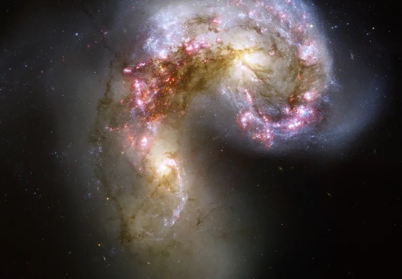 This NASA Hubble Space Telescope image of the Antennae galaxies (NGC 4038 & 4039) is the sharpest yet of this merging pair of galaxies. During the course of the collision, billions of stars will be formed.