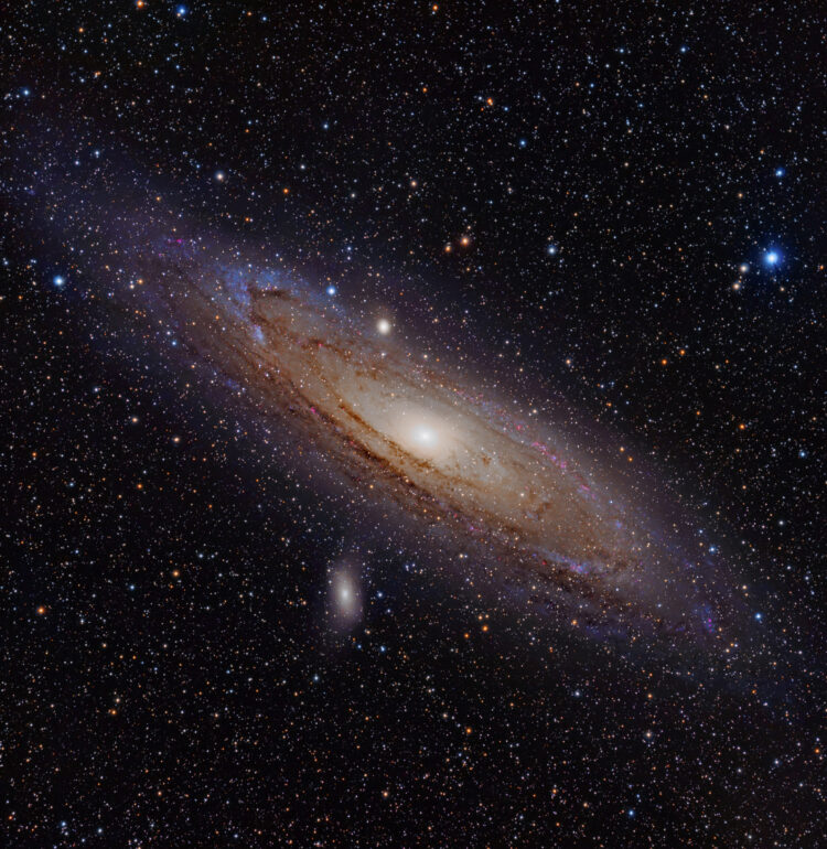 The Andromeda Galaxy is a spiral galaxy approximately 2.5 million light-years away in the constellation Andromeda. The image also shows Messier Objects 32 and 110, as well as NGC 206 (a bright star cloud in the Andromeda Galaxy) and the star Nu Andromedae. This image was taken using a hydrogen-alpha filter.