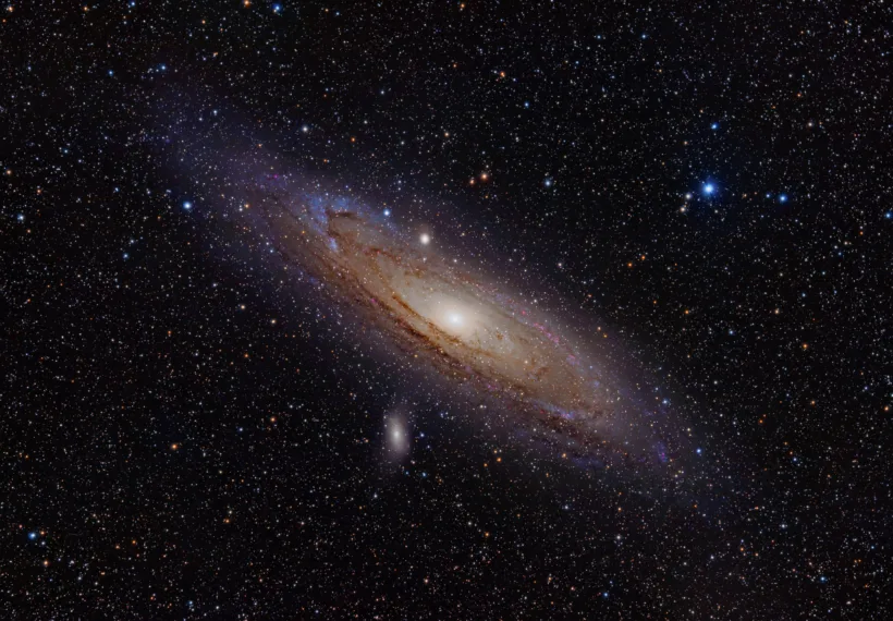 The Andromeda Galaxy is a spiral galaxy approximately 2.5 million light-years away in the constellation Andromeda. The image also shows Messier Objects 32 and 110, as well as NGC 206 (a bright star cloud in the Andromeda Galaxy) and the star Nu Andromedae. This image was taken using a hydrogen-alpha filter.