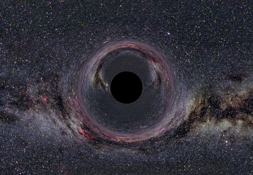 A simulated Black Hole of ten solar masses as seen from a distance of 600km with the Milky Way in the background