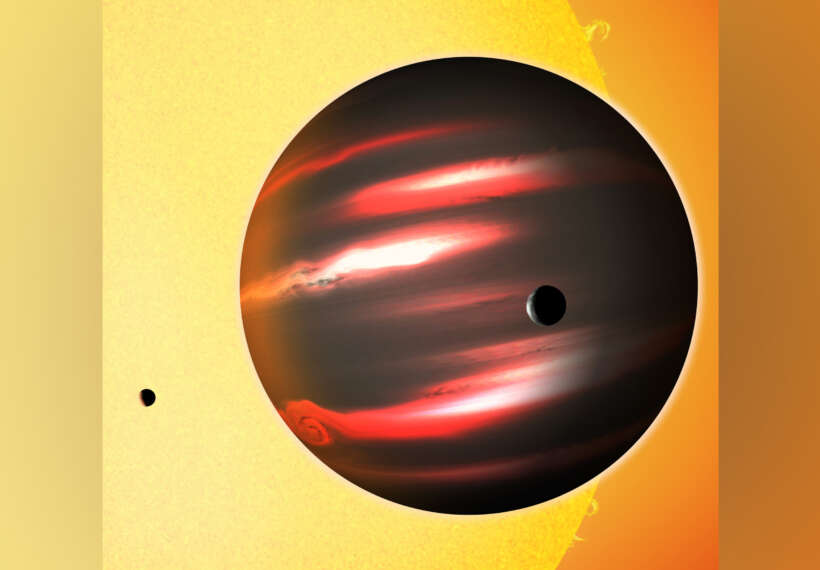 The distant exoplanet TrES-2b, shown here in an artist's conception, is darker than the blackest coal. This Jupiter-sized world reflects less than one percent of the light that falls on it, making it blacker than any planet or moon in our solar system. Astronomers aren't sure what vapours in the planet's superheated atmosphere cloak it so effectively.