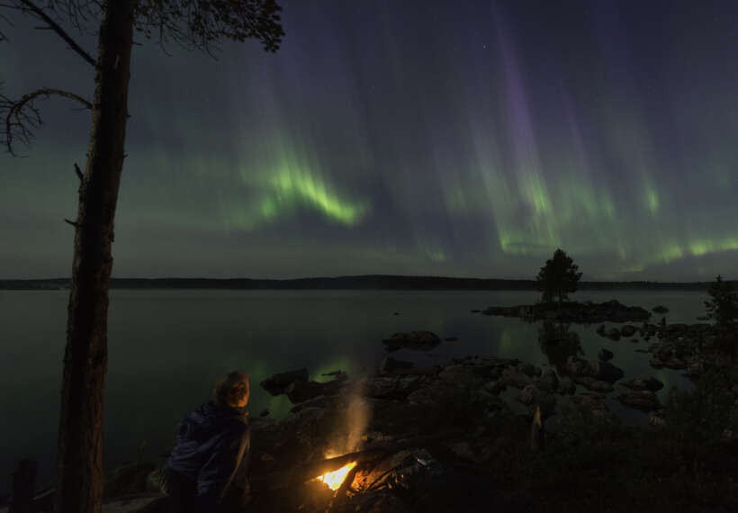 Northern lights at a campfire in northern Norway