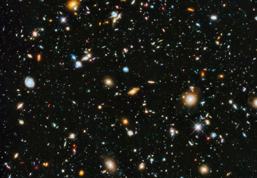 Composite image showing the visible and near infrared light spectrum This is a composite image showing the visible and near infrared light spectrum collected from Hubble's ACS and WFC3 instruments over a nine-year period.