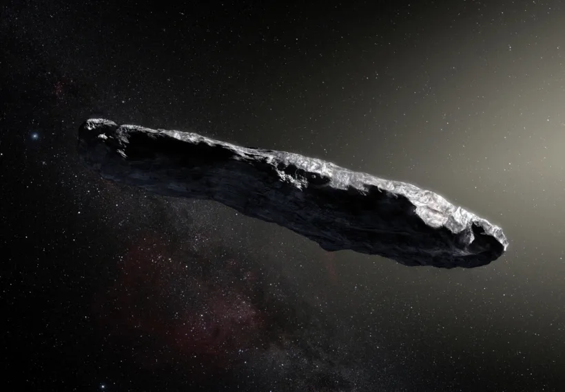 This artist’s impression shows the first interstellar asteroid: `Oumuamua. This unique object was discovered on 19 October 2017 by the Pan-STARRS 1 telescope in Hawai`i. Subsequent observations from ESO’s Very Large Telescope in Chile and other observatories around the world show that it was travelling through space for millions of years before its chance encounter with our star system. `Oumuamua seems to be a dark red highly-elongated metallic or rocky object, about 400 metres long, and is unlike anything normally found in the Solar System.