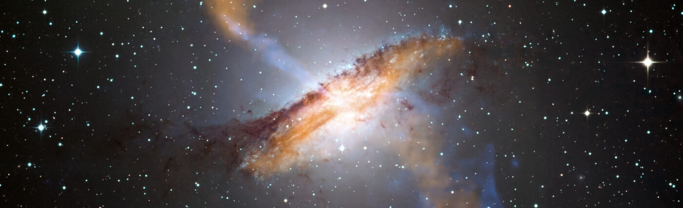 This image of Centaurus A shows a spectacular new view of a supermassive black hole's power. Jets and lobes powered by the central black hole in this nearby galaxy are shown by submillimeter data (colored orange) from the Atacama Pathfinder Experiment (APEX) telescope in Chile and X-ray data (colored blue) from the Chandra X-ray Observatory.