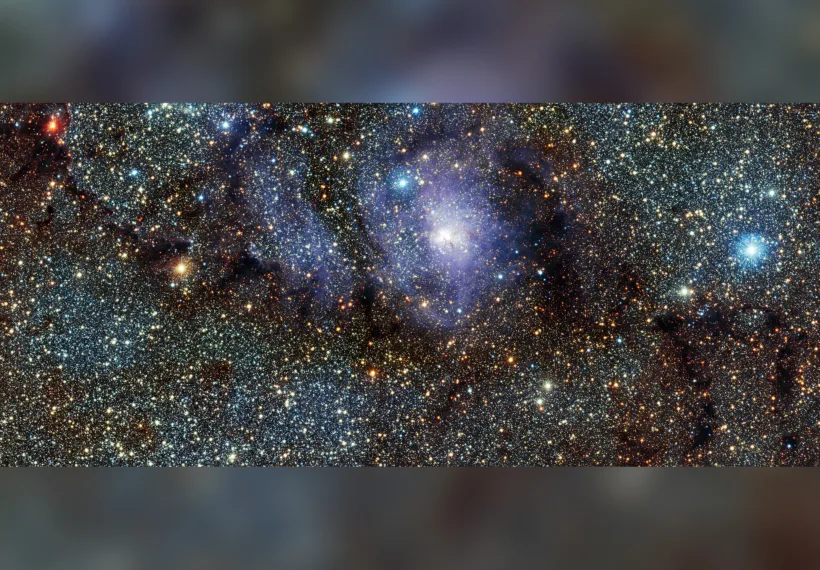 This new infrared view of the star formation region Messier 8, often called the Lagoon Nebula, was captured by the VISTA telescope at ESO’s Paranal Observatory in Chile. This colour picture was created from images taken through J, H and Ks near-infrared filters, and which were acquired as part of a huge survey of the central parts of the Milky Way. The field of view is about 34 by 15 arcminutes.