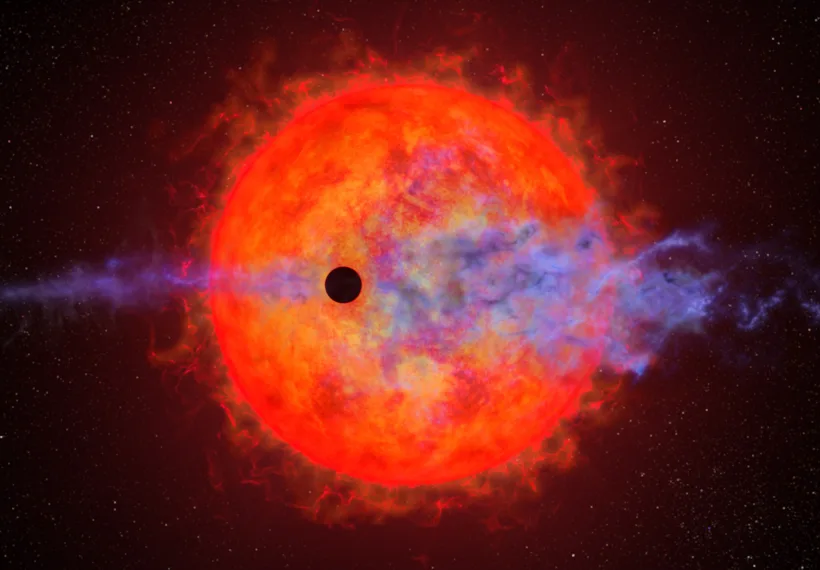 A young planet whirling around a petulant red dwarf star is changing in unpredictable ways orbit-by-orbit. It is so close to its parent star that it experiences a consistent, torrential blast of energy, which evaporates its hydrogen atmosphere — causing it to puff off the planet.Located 32 light-years from Earth, the parent star AU Microscopii (AU Mic) hosts one of the youngest planetary systems ever observed.