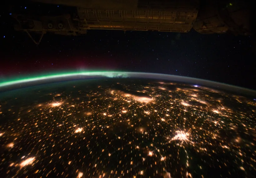 When viewed from the International Space Station (ISS), the night skies are illuminated with light from many sources. For example, the Midwestern United States presents a nighttime appearance not unlike a patchwork quilt when viewed from orbit.