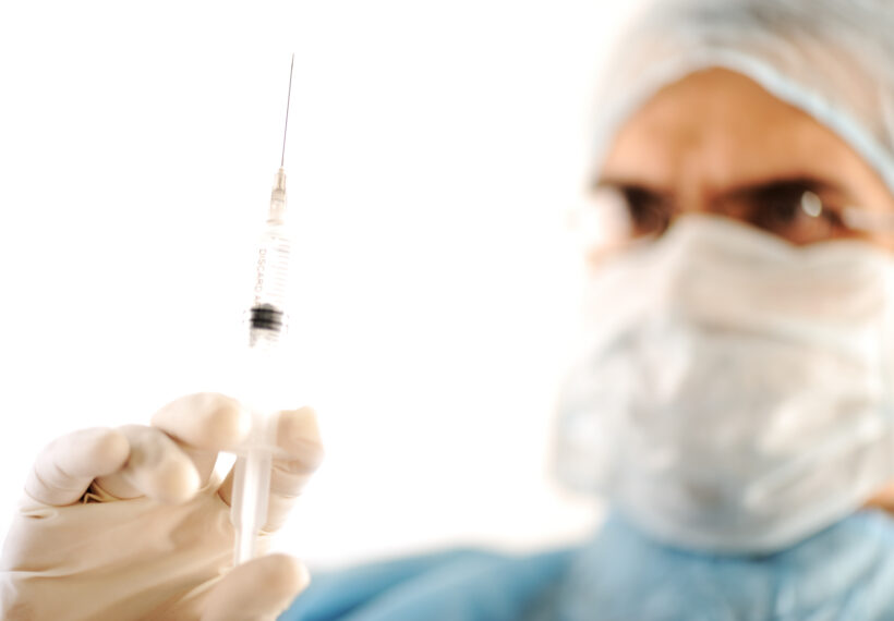Surgeon Holding Injection Vaccine