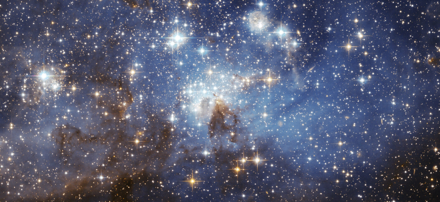 The image is from the European Space Agency. It is listed as the LH 95 star forming region of the Large Magellanic Cloud. The image was taken using the Hubble Space Telescope.