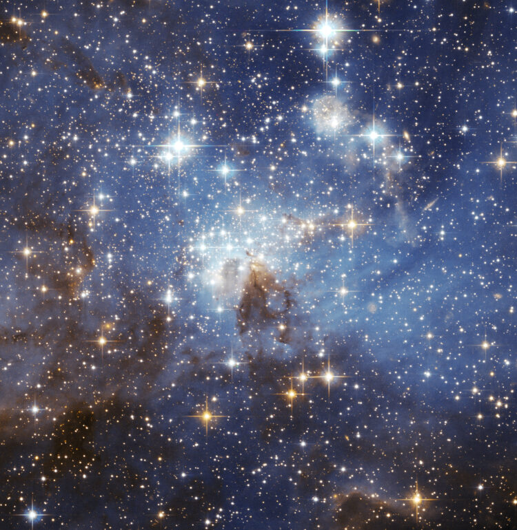 The image is from the European Space Agency. It is listed as the LH 95 star forming region of the Large Magellanic Cloud. The image was taken using the Hubble Space Telescope.