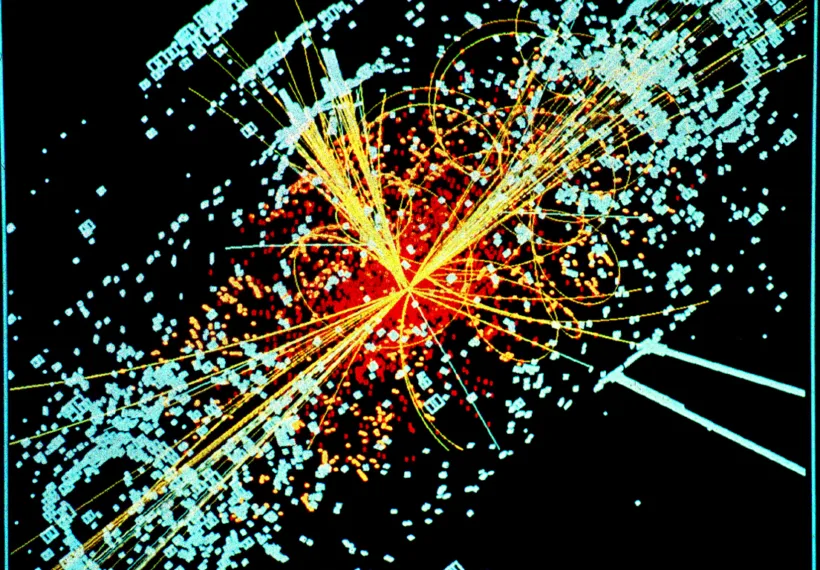 An example of simulated data modeled for the CMS particle detector on the Large Hadron Collider (LHC) at CERN. Here, following a collision of two protons, a Higgs boson is produced which decays into two jets of hadrons and two electrons. The lines represent the possible paths of particles produced by the proton-proton collision in the detector while the energy these particles deposit is shown in blue. More CMS events at CMS Media