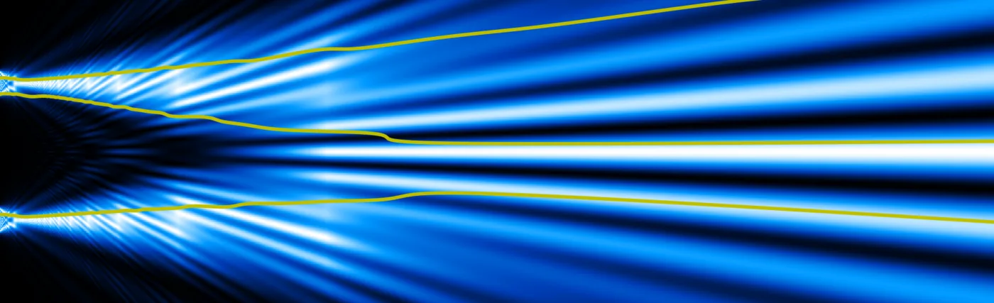 3 trajectories of electrons for the two-slit experiment. Each electron is guided by its wave function. While each trajectory passes through only one slit, the wave passes through both.