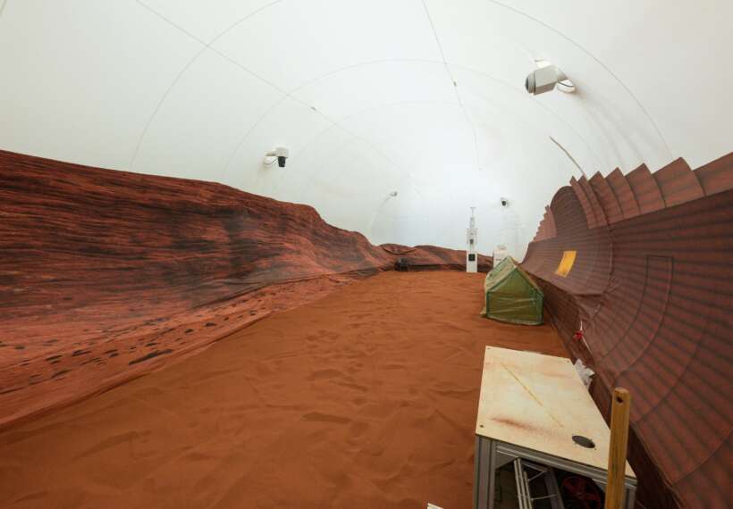 NASA’s simulated Mars habitat includes a 1,200-square-foot sandbox with red sand to simulate the Martian landscape. The area will be used to conduct simulated spacewalks or “Marswalks” during the analog missions. PHOTO DATE: 11-30-22 LOCATION: Bldg. 220 - CHAPEA SUBJECT: Photography of Crew Health and Performance Exploration Analog (CHAPEA) facility PHOTOGRAPHER: BILL STAFFORD